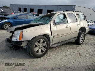 2009 GMC Yukon SLT 4SA z VIN 1GKEC333X9R244790, wystawiony jako Copart lot #86259474 z przebiegiem Nie podano mil oraz Szkoda całkowita • Salvage title. Historia ofert i sprzedaży dostępna na DreamBid. Obrazek 1.