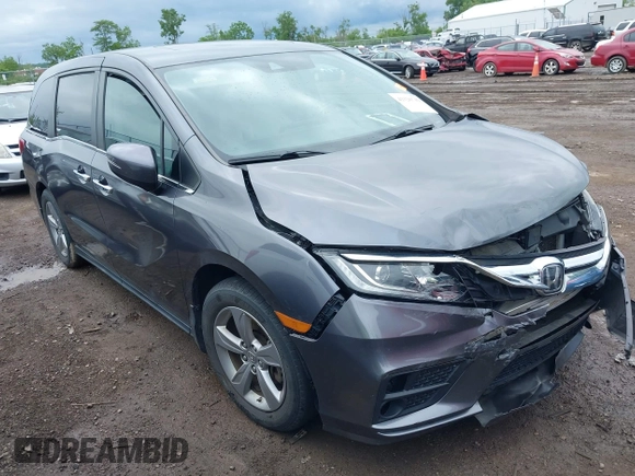2018 Honda Odyssey EX-L z VIN 5FNRL6H74JB043276, wystawiony jako IAAI lot #42326742 z przebiegiem 126 025 mil mil oraz . Historia ofert i sprzedaży dostępna na DreamBid. Obrazek 1.