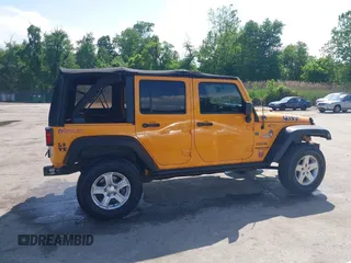 2013 Jeep Wrangler Unlimited Sport z VIN 1C4HJWDGXDL538395, wystawiony jako IAAI lot #42265264 z przebiegiem 154 080 mil mil oraz . Historia ofert i sprzedaży dostępna na DreamBid. Obrazek 14.