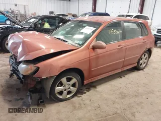 2007 Kia Spectra with VIN KNAFE162575000628, listed as a IAAI auction lot 41353741 with 152,693 mi miles. Bid and sale history available at carsss.com. Image 2.