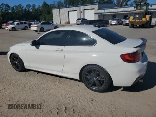 2016 BMW 2 Series M235i xDrive with VIN WBA1J9C50GV371750, listed as a Copart auction lot 74323344 with 92,512 mi miles and Clean Title. Bid and sale history available at carsss.com. Image 2.