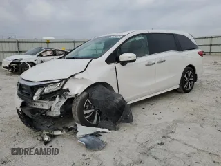 2024 Honda Odyssey Touring z VIN 5FNRL6H81RB063067, wystawiony jako Copart lot #49789175 z przebiegiem 16 581 mil mil oraz Szkoda całkowita • Salvage title. Historia ofert i sprzedaży dostępna na DreamBid. Obrazek 1.