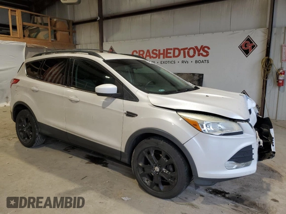 2013 Ford Escape SE z VIN 1FMCU0GX6DUC13677, wystawiony jako Copart lot #44182215 z przebiegiem 96 623 mil mil oraz Szkoda całkowita • Salvage title. Historia ofert i sprzedaży dostępna na DreamBid. Obrazek 4.