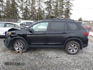 2022 Honda Passport TrailSport z VIN 5FNYF8H63NB001094, wystawiony jako IAAI lot #41765935 z przebiegiem 44 366 mil mil oraz . Historia ofert i sprzedaży dostępna na DreamBid. Obrazek 14.