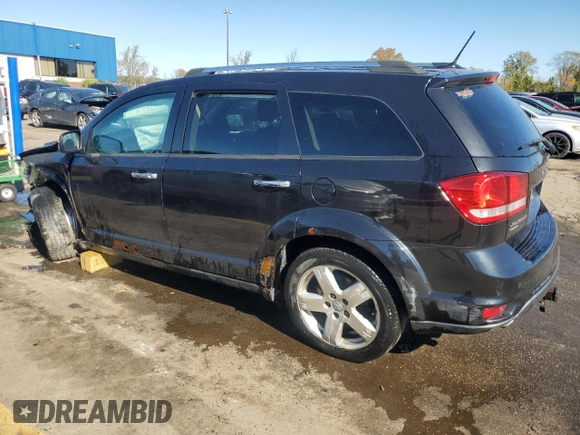 2013 Dodge Journey R/T with VIN 3C4PDDFG6DT724444, listed as a Copart auction lot 76496624 with 283,593 mi miles and Clean title. Bid and sale history available at DreamBid. Image 2.