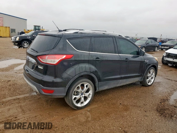 2014 Ford Escape Titanium с VIN 1FMCU0J90EUA04690, выставлен на аукционе Copart как лот 58421735 с пробегом 200 743 миль миль и Чистый • Clean title. История ставок и продаж доступна на DreamBid. Изображение 3.
