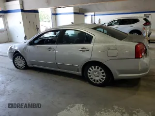 2006 Mitsubishi Galant ES z VIN 4A3AB36F16E071051, wystawiony jako Copart lot #62706024 z przebiegiem 137 959 mil mil oraz Szkoda całkowita • Salvage title. Historia ofert i sprzedaży dostępna na DreamBid. Obrazek 2.
