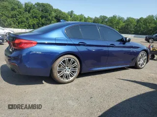 2020 BMW 5 Series M550i xDrive with VIN WBAJS7C0XLBN96338, listed as a Copart auction lot 60591815 with 73,910 mi miles and Salvage title. Bid and sale history available at DreamBid. Image 3.