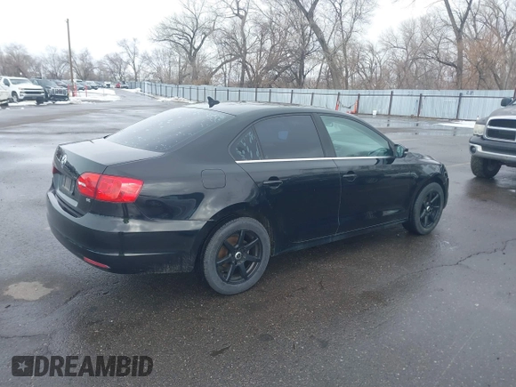 2014 Volkswagen Jetta SE with VIN 3VWD17AJXEM370663, listed as a IAAI auction lot 41612207 with 135,215 mi miles and . Bid and sale history available at DreamBid. Image 4.
