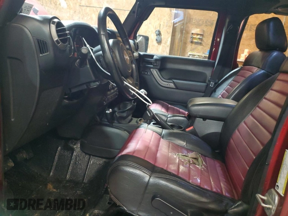 2012 Jeep Wrangler Unlimited Sport z VIN 1C4BJWDG8CL282181, wystawiony jako Copart lot #53863375 z przebiegiem 92 984 mil mil oraz Szkoda całkowita • Salvage title. Historia ofert i sprzedaży dostępna na DreamBid. Obrazek 7.