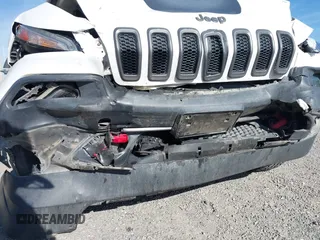 2017 Jeep Cherokee Trailhawk L Plus z VIN 1C4PJMBS1HD217370, wystawiony jako IAAI lot #42486588 z przebiegiem 108 695 mil mil oraz . Historia ofert i sprzedaży dostępna na DreamBid. Obrazek 6.