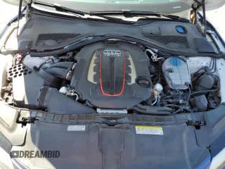 2015 Audi S7 z VIN WAUW2AFCXFN032765, wystawiony jako Copart lot #56916125 z przebiegiem 91 610 mil mil oraz Szkody całkowita. Historia ofert i sprzedaży dostępna na DreamBid. Obrazek 11.