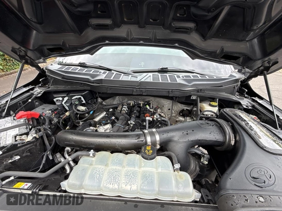 2021 Ford F-150 XL with VIN 1FTFW1E86MKD57397, listed as a Copart auction lot 62959355 with 59,227 mi miles and Salvage title. Bid and sale history available at DreamBid. Image 7.
