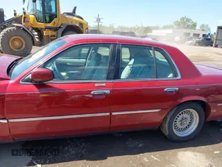 2002 Mercury Grand Marquis LS Premium z VIN 2MEFM75W22X653775, wystawiony jako IAAI lot #42225138 z przebiegiem 124 749 mil mil oraz . Historia ofert i sprzedaży dostępna na DreamBid. Obrazek 14.