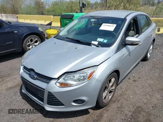 2013 Ford Focus SE with VIN 1FADP3F28DL307076, listed as a IAAI auction lot 42098620 with 182,555 mi miles. Bid and sale history available at carsss.com. Image 2.