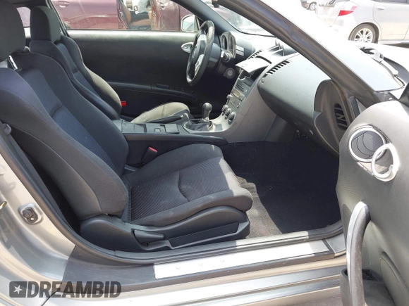 2003 Nissan 350Z Touring with VIN JN1AZ34D33T112077, listed as a IAAI auction lot 42305802 with 202,770 mi miles and . Bid and sale history available at DreamBid. Image 5.