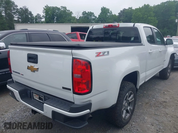 2020 Chevrolet Colorado 4WD Z71 with VIN 1GCGTDEN8L1238033, listed as a IAAI auction lot 42279524 with 22,164 mi miles and . Bid and sale history available at DreamBid. Image 4.