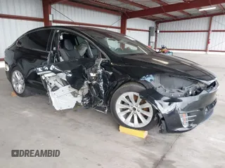 2017 Tesla Model X 90D with VIN 5YJXCAE21HF041207, listed as a IAAI auction lot 41766065 with Not Provided miles and . Bid and sale history available at DreamBid. Image 1.