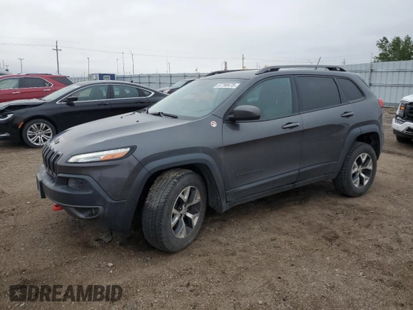 2015 Jeep Cherokee Trailhawk with VIN 1C4PJMBB6FW574108, listed as a Copart auction lot 57798475 with 105,022 mi miles and Salvage title. Bid and sale history available at DreamBid. Image 1.