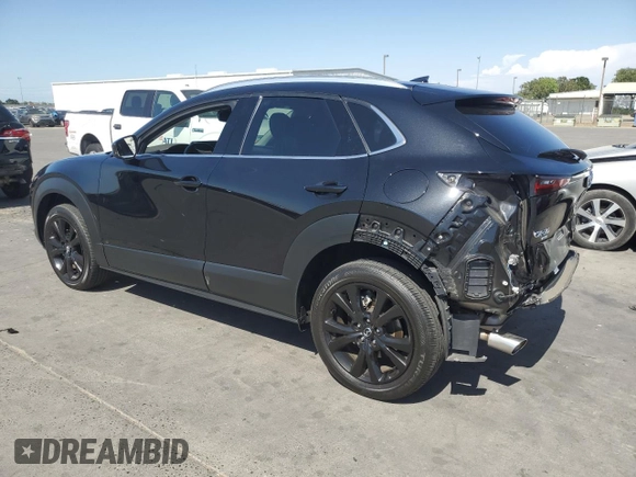 2023 Mazda CX-30 Premium Plus with VIN 3MVDMBEY0PM578346, listed as a Copart auction lot 58572345 with 14,027 mi miles and Salvage title. Bid and sale history available at DreamBid. Image 2.