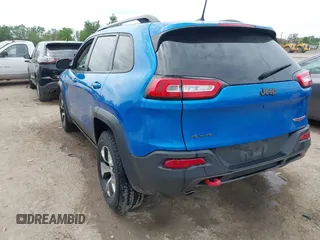 2017 Jeep Cherokee Trailhawk with VIN 1C4PJMBS2HW612792, listed as a IAAI auction lot 42373828 with 74,106 mi miles and . Bid and sale history available at DreamBid. Image 3.