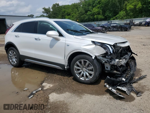 2019 Cadillac XT4 FWD Premium Luxury с VIN 1GYFZCR41KF127888, выставлен на аукционе Copart как лот 55027135 с пробегом 111 057 миль миль и Списание • Salvage title. История ставок и продаж доступна на DreamBid. Изображение 4.