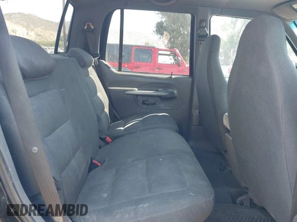 2001 Ford Explorer Sport Trac z VIN 1FMZU77E91UB34713, wystawiony jako IAAI lot #42754266 z przebiegiem 234 203 mil mil oraz . Historia ofert i sprzedaży dostępna na DreamBid. Obrazek 8.