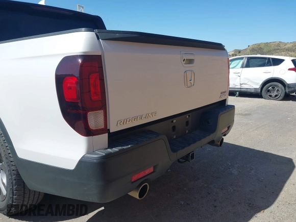 2023 Honda Ridgeline Sport z VIN 5FPYK3F13PB060341, wystawiony jako IAAI lot #41955592 z przebiegiem 27 927 mil mil oraz . Historia ofert i sprzedaży dostępna na DreamBid. Obrazek 17.