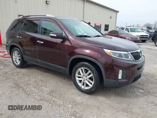 2015 Kia Sorento LX with VIN 5XYKT4A77FG587237, listed as a IAAI auction lot 41748791 with 214,454 mi miles. Bid and sale history available at carsss.com. Image 1.