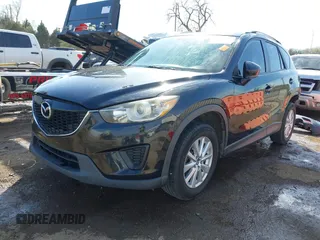 2014 Mazda CX-5 Sport with VIN JM3KE4BE6E0388909, listed as a IAAI auction lot 41876514 with 196,882 mi miles. Bid and sale history available at carsss.com. Image 19.