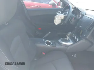 2015 Nissan 370Z Sport with VIN JN1AZ4EH9FM443719, listed as a IAAI auction lot 41677286 with 87,967 mi miles and . Bid and sale history available at DreamBid. Image 5.