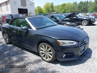 2018 Audi A5 Cabriolet Premium Plus z VIN WAUYNGF53JN000298, wystawiony jako IAAI lot #42356280 z przebiegiem 112 025 mil mil oraz . Historia ofert i sprzedaży dostępna na DreamBid. Obrazek 1.