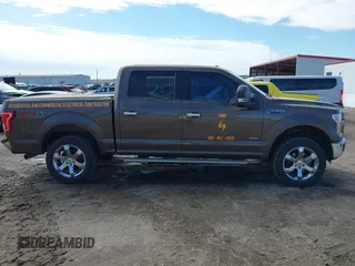 2015 Ford F-150 XLT with VIN 1FTEW1EG8FKE04306, listed as a IAAI auction lot 41864522 with 133,373 mi miles. Bid and sale history available at carsss.com. Image 13.
