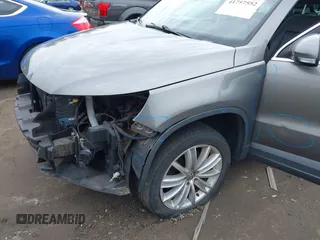 2011 Volkswagen Tiguan SE with VIN WVGBV7AX4BW532524, listed as a IAAI auction lot 41757552 with 141,115 mi miles and . Bid and sale history available at DreamBid. Image 12.