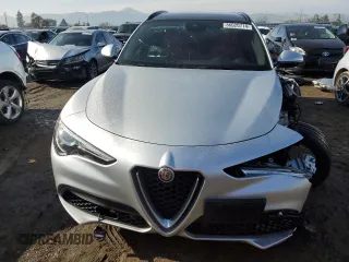 2019 Alfa Romeo Stelvio Ti z VIN ZASPAKBN2K7C40054, wystawiony jako Copart lot #86020774 z przebiegiem 16 135 mil mil oraz Szkody całkowita. Historia ofert i sprzedaży dostępna na DreamBid. Obrazek 5.