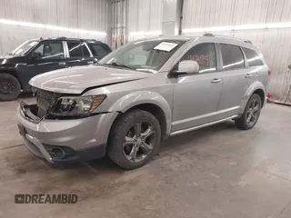 2015 Dodge Journey Crossroad with VIN 3C4PDCGG8FT631064, listed as a IAAI auction lot 41235846 with 127,718 mi miles and . Bid and sale history available at DreamBid. Image 2.