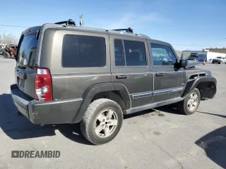 2006 Jeep Commander with VIN 1J8HH48K26C263986, listed as a Copart auction lot 84712294 with 216,923 mi miles and Salvage title. Bid and sale history available at DreamBid. Image 3.