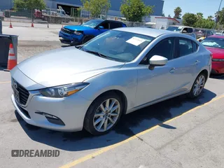 2017 Mazda 3 Touring with VIN 3MZBN1V76HM119389, listed as a IAAI auction lot 42772015 with 128,555 mi miles and . Bid and sale history available at DreamBid. Image 17.