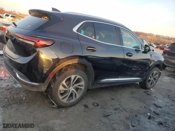 2021 Buick Envision Essence with VIN LRBFZNR47MD098766, listed as a Copart auction lot 42223685 with 28,744 mi miles and Salvage Title. Bid and sale history available at carsss.com. Image 3.