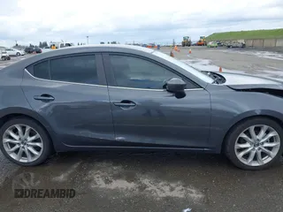 2014 Mazda 3 S Touring with VIN JM1BM1V31E1132448, listed as a IAAI auction lot 41815085 with 144,705 mi miles and . Bid and sale history available at DreamBid. Image 13.