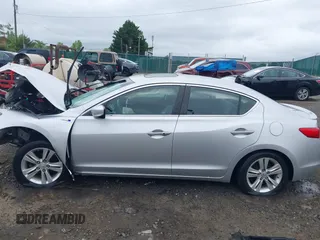 2013 Acura ILX Hybrid Technology z VIN 19VDE3F78DE302392, wystawiony jako IAAI lot #42207701 z przebiegiem 174 587 mil mil oraz . Historia ofert i sprzedaży dostępna na DreamBid. Obrazek 15.