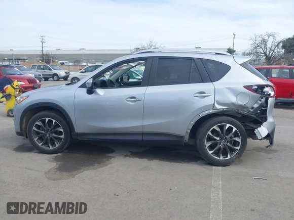 2016 Mazda CX-5 Grand Touring with VIN JM3KE2DY9G0723921, listed as a IAAI auction lot 41681522 with 83,893 mi miles. Bid and sale history available at carsss.com. Image 14.