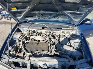 1998 Ford Escort SE with VIN 1FAFP13P4WW288248, listed as a IAAI auction lot 41456179 with 223,155 mi miles. Bid and sale history available at carsss.com. Image 10.