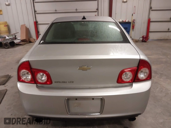 2012 Chevrolet Malibu LTZ with VIN 1G1ZG5E77CF375464, listed as a IAAI auction lot 41509140 with 197,329 mi miles and . Bid and sale history available at DreamBid. Image 16.