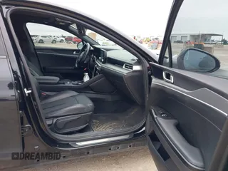 2021 Kia K5 GT-Line z VIN 5XXG64J22MG008335, wystawiony jako IAAI lot #41633257 z przebiegiem 90 534 mil mil oraz . Historia ofert i sprzedaży dostępna na DreamBid. Obrazek 5.