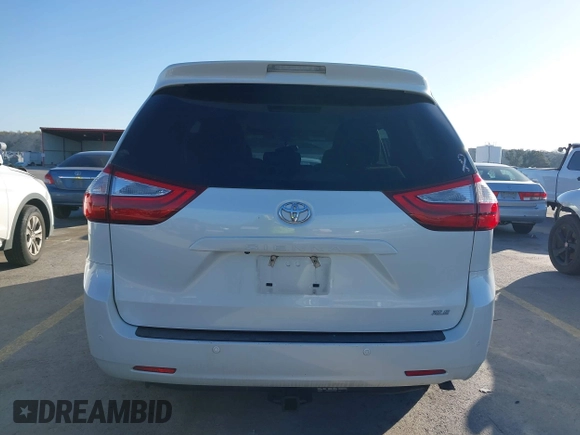 2016 Toyota Sienna XLE with VIN 5TDYK3DC6GS758189, listed as a IAAI auction lot 41598251 with 129,050 mi miles and . Bid and sale history available at DreamBid. Image 16.