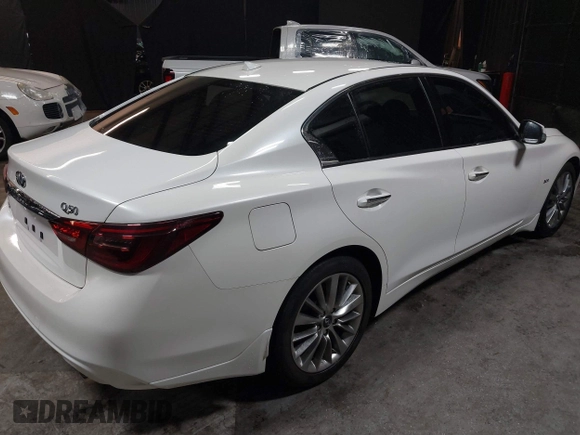 2020 Infiniti Q50 Luxe with VIN JN1EV7AR4LM251732, listed as a IAAI auction lot 41482077 with 12,799 mi miles and . Bid and sale history available at DreamBid. Image 4.