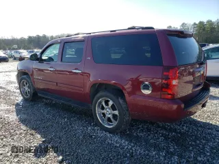 2007 Chevrolet Suburban LS with VIN 1GNFC16057J212547, listed as a Copart auction lot 48611455 with 257,188 mi miles and Salvage Title. Bid and sale history available at carsss.com. Image 2.