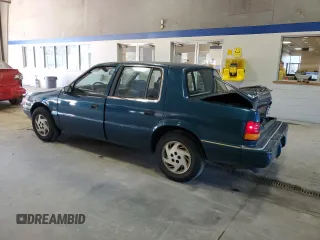 1994 Dodge Spirit Highline z VIN 1B3AA4636RF148742, wystawiony jako Copart lot #45249505 z przebiegiem 89 040 mil mil oraz Szkody całkowita. Historia ofert i sprzedaży dostępna na DreamBid. Obrazek 2.