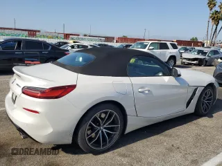 2022 BMW Z4 sDrive30i with VIN WBAHF3C02NWX82592, listed as a Copart auction lot 54182084 with 26,809 mi miles. Bid and sale history available at carsss.com. Image 3.